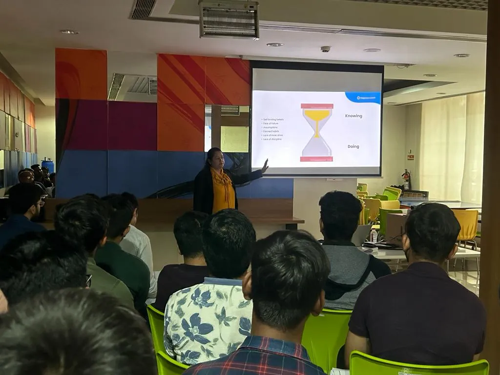 Coach presenting with slide deck