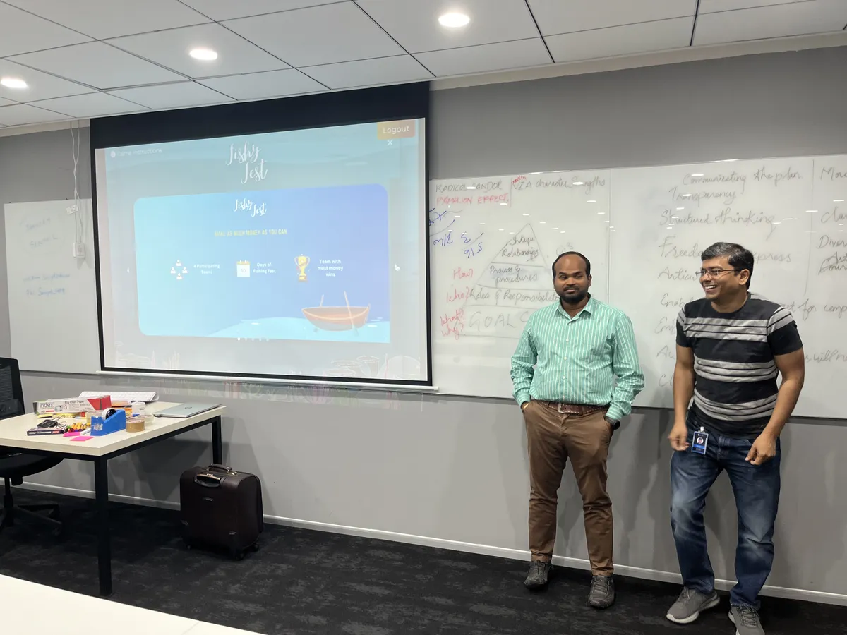 Two presenters with Walnut platform on screen